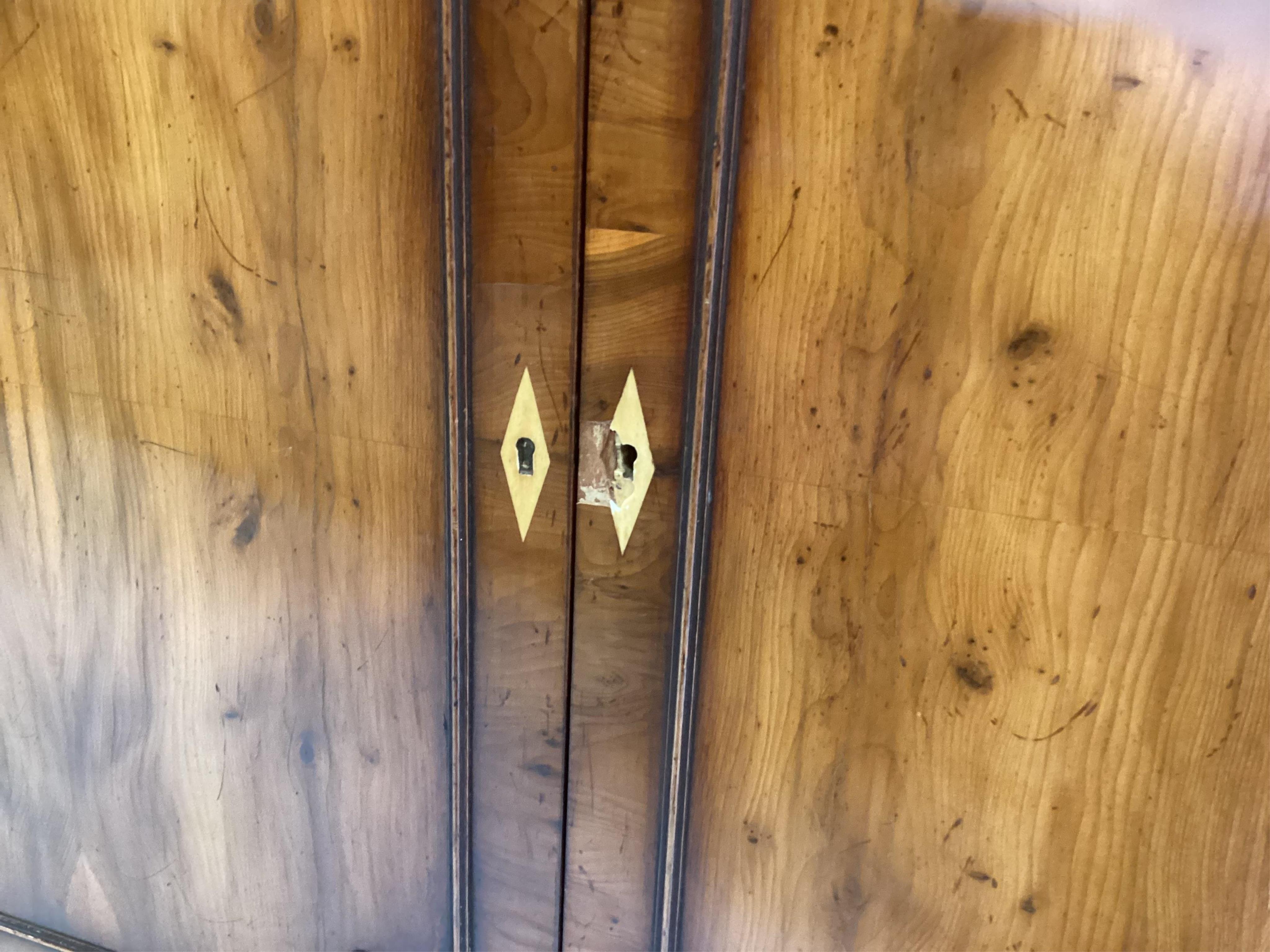 A reproduction yew breakfront side cabinet, width 153cm, depth 38cm, height 84cm. Condition - fair
